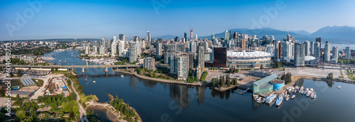 Vancouver, BC, Canada - panoramic aerial city view of famous False Creek in Vancouver downtown with Cambie Bridge and BC Place Stadium in front and Vancouver Skyline in the background  photo