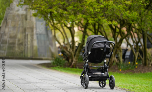 baby carriage abandoned in an alley.