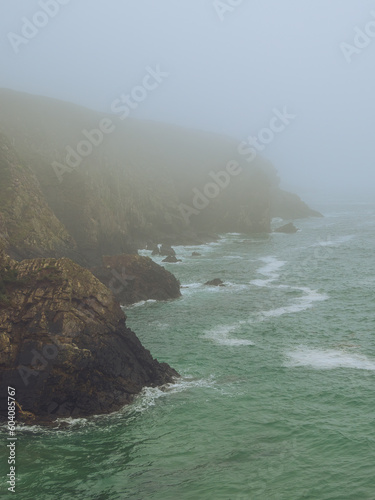 Foggy Caerfai Beach on the Pembrokeshire coast, Wales photo