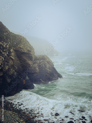 Foggy Caerfai Beach on the Pembrokeshire coast, Wales photo