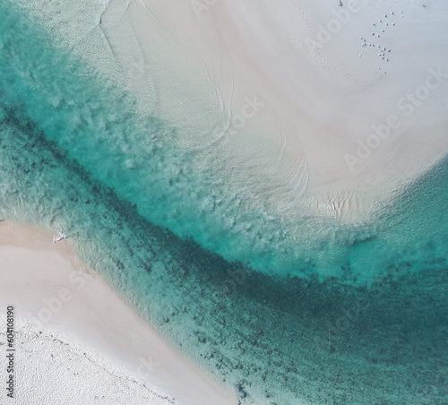 Aerial view of ocean patters with different depths, sand bar patterns and textures photo