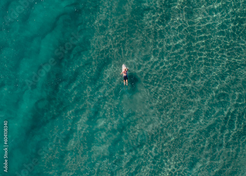 View of a surfer in a blue ocean © FRPhotos