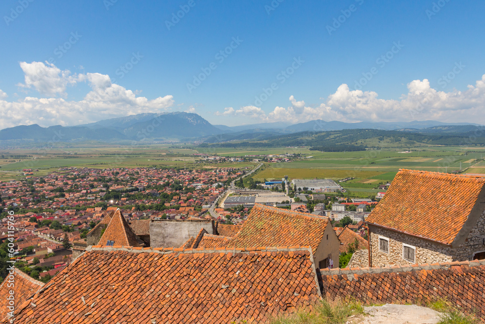 View of the city of Rasnov from the territory of the medieval fortress Rasnov Citadel in the mountains of Transylvania. Romania