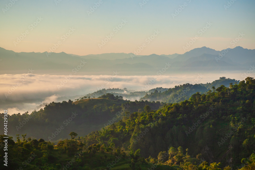 Himalaya hills in mist, sunrise landscape