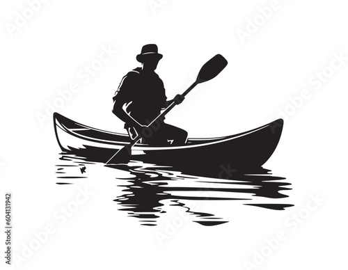 Fototapeta Silhouette of person cruising on lake with canoe