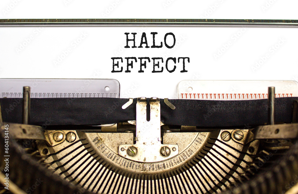 Halo effect and psychological symbol. Concept words Halo effect typed on beautiful old retro typewriter. Beautiful white background. Business psychological and Halo effect concept. Copy space.