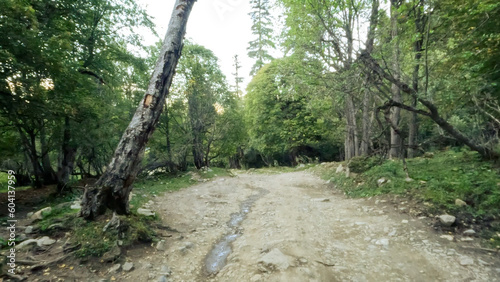 mountain rough touristic ground road with no bitumen cover - photo of nature
