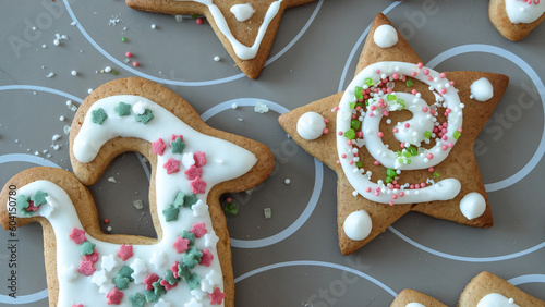 Decorated with icing and dressing gignger christmas cookies