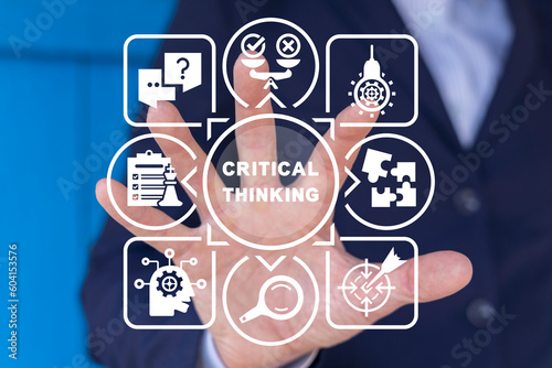 Canvas Print Man using virtual touchscreen sees inscription: CRITICAL THINKING
