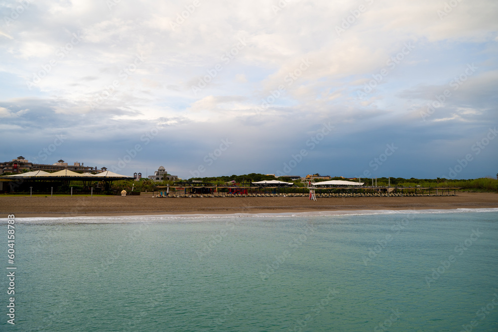 Sun loungers on the beach at sunrise. Sun loungers on the beach at sunrise.