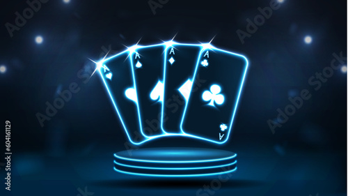 Neon bright poker cards on the podium. The concept for Casino on a dark blue background.