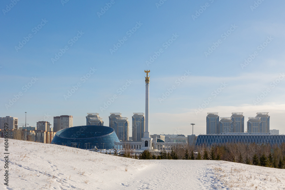 Modern residential buildings on sunny winter day, Nur-Sultan, Astana, Kazakhstan. High quality photo Modern residential buildings on sunny winter day, Nur-Sultan, Astana, Kazakhstan. High quality photo