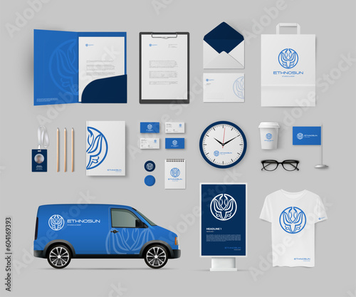 Stationery design mockup. Branding template with blue ornament logo and dark blue background. Corporate identity set with folder, A4 form, business card and envelope.