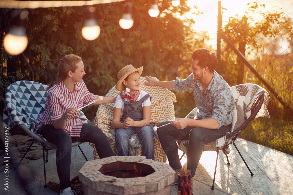 Fireside Delights: Marshmallow Roasting with the Perfect Family Trio