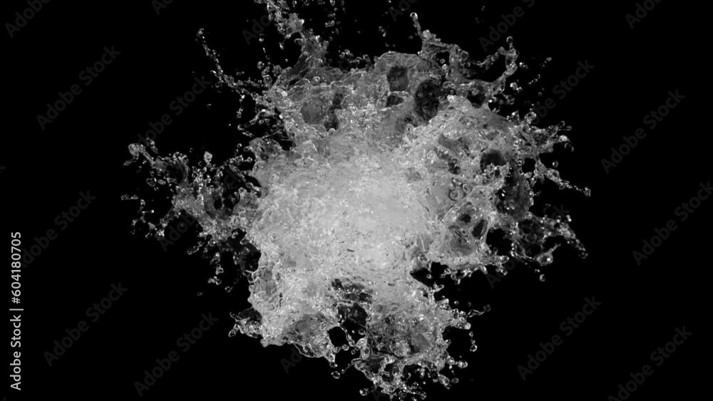 Super slow motion of splashing water on black background. Filmed on high speed cinema camera, 1000fps. Top view shot. Super slow motion of splashing water on black background. Filmed on high speed cinema camera, 1000fps. Top view shot.