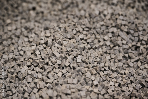 Фотография Pile of tumbling mediums for vibratory finishing machine