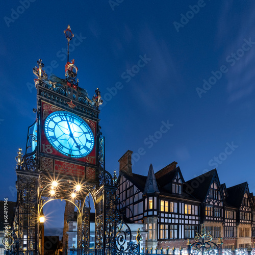 The Victorian Eastgate Clock on the city walls at night, Eastgate Street, Chester, Cheshire, England, United Kingdom photo