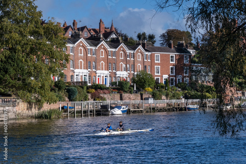 Rowers on the River Dee passing Deva Terrace, Chester, Cheshire, England, United Kingdom photo