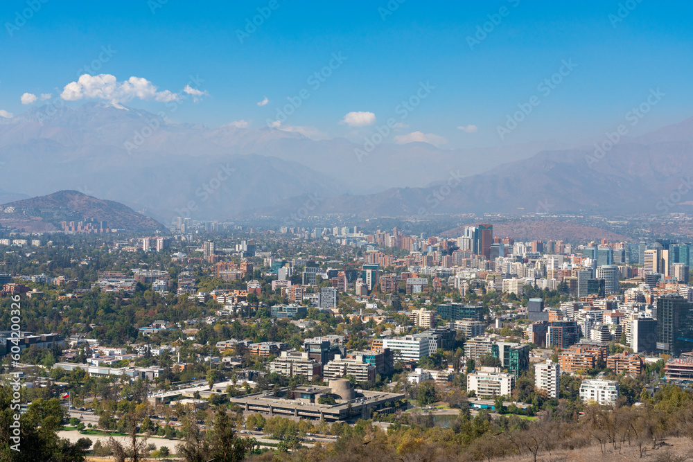 Vitacura and Jardin del Este neighborhoods seen from San Cristobal Hill (Metropolitan Park) with Andes in background, Santiago Metropolitan Region, Chile Vitacura and Jardin del Este neighborhoods seen from San Cristobal Hill (Metropolitan Park) with Andes in background, Santiago Metropolitan Region, Chile