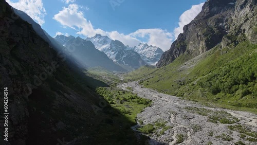 Aerial view of the Mizhirgi Gorge and mountain peaks covered with snow photo