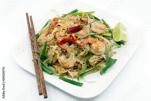 The classic Thai dish Pad Thai, consisting of fried noodles with shrimps, bean sprouts, fried tofu, crushed peanuts and spring onion, France photo