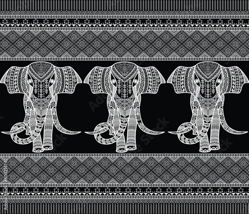 Tradition elephant pattern is very popular in local of North-East Thailand. Art for fabric seamless ethnic repeat batik carpet print and textile tile. 