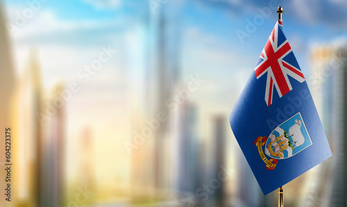A small Falkland Islands flag on an abstract blurry background