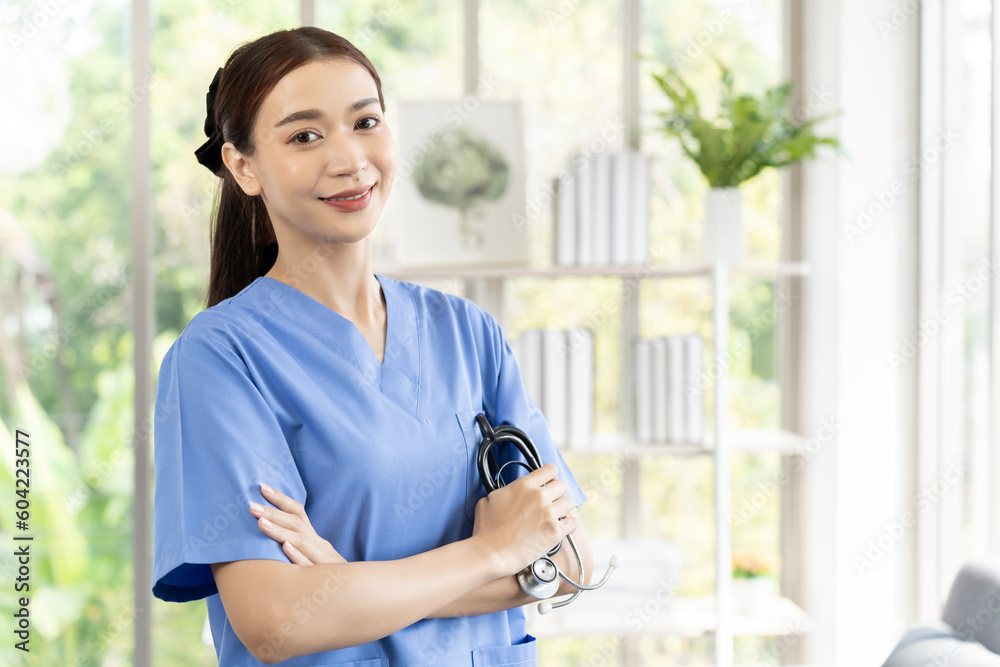 Portrait of young female Doctor in uniform standing in hospital Portrait of young female Doctor in uniform standing in hospital