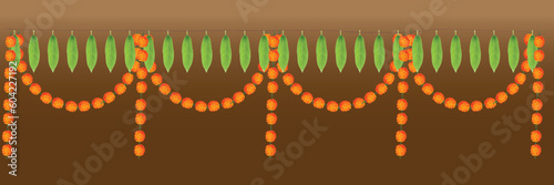 Marigold garland and mango leaves toran for indian festive decorations