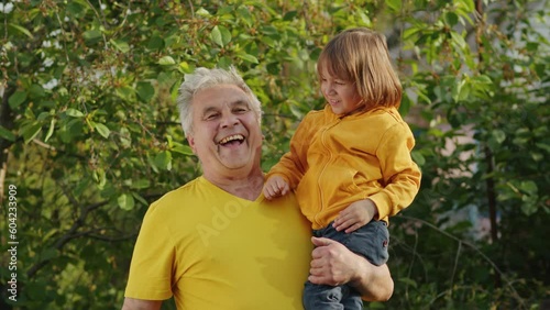 Blooming Connections: A girl and her father, united in their love for the environment, sow seeds of happiness in their organic garden