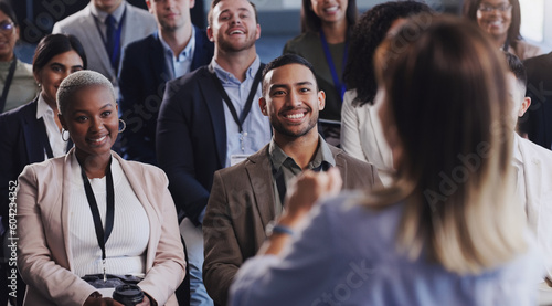 Audience, conference and business people listening to speaker at a seminar, workshop or training. Diversity men and women crowd at a presentation for learning, knowledge and corporate discussion