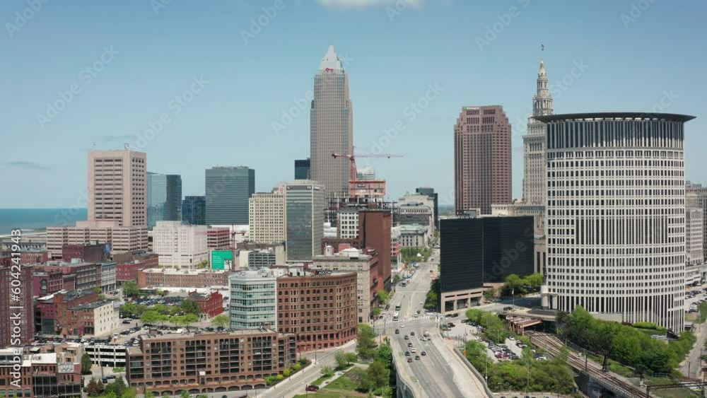 Cleveland Ohio downtown skyline 4K drone up left orbit wide