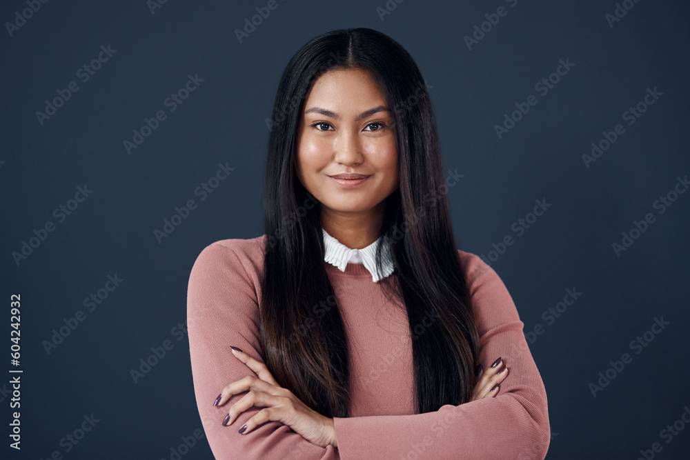 Smile, portrait of Korean woman with arms crossed and on a dark background. Empowerment or confident, professional corporate worker and pose with happy young businesswoman in a studio backdrop. Smile, portrait of Korean woman with arms crossed and on a dark background. Empowerment or confident, professional corporate worker and pose with happy young businesswoman in a studio backdrop.