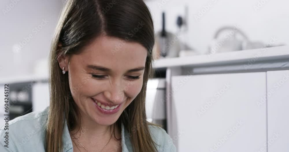 Smell, smile and a woman doing fresh laundry from the washing machine in an apartment. Happy, young and a home cleaner smelling a towel or clothes from the wash for happiness and housekeeping