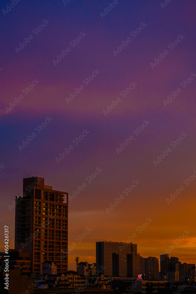 City building colorful sunset sky silhouette scene