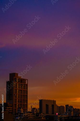 City building colorful sunset sky silhouette scene
