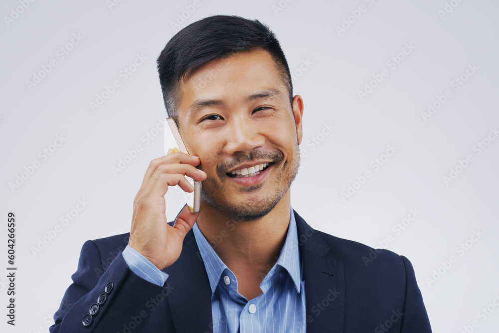 Phone call, smile and portrait of Asian man talking in studio isolated on a white background. Cellphone, happy and face of business person in communication, speaking or discussion, network and chat. Phone call, smile and portrait of Asian man talking in studio isolated on a white background. Cellphone, happy and face of business person in communication, speaking or discussion, network and chat.