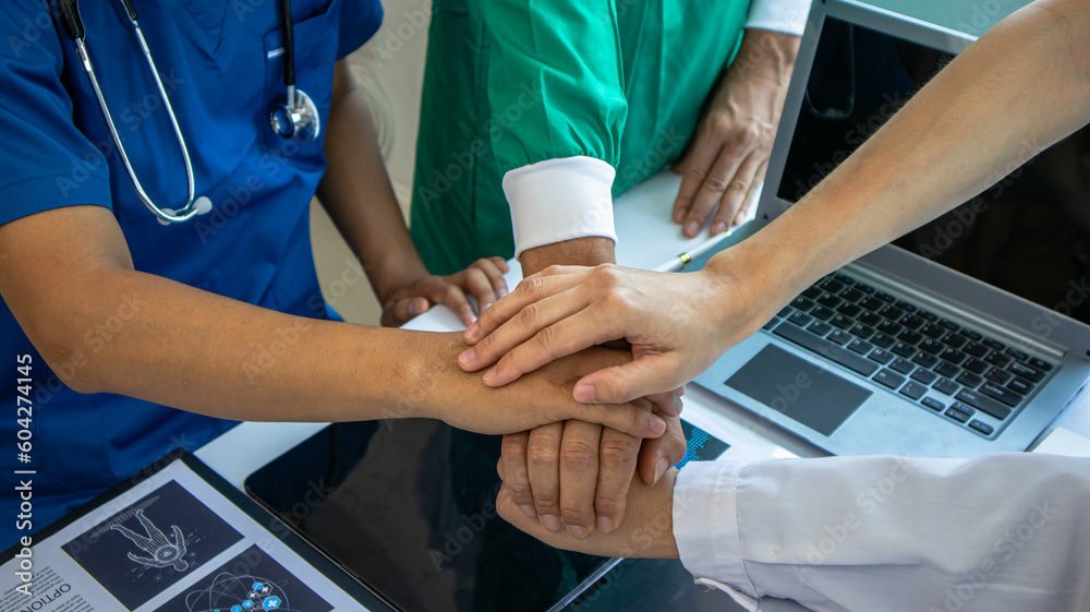 Medical team and business people use computers during office meetings.