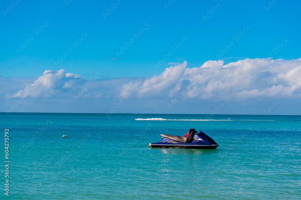 summer vacation jetski at seascape, copy space. summer vacation jetski at seaside. photo of summer vacation jetski on the beach. summer vacation jetski summer vacation jetski at seascape, copy space. summer vacation jetski at seaside. photo of summer vacation jetski on the beach. summer vacation jetski