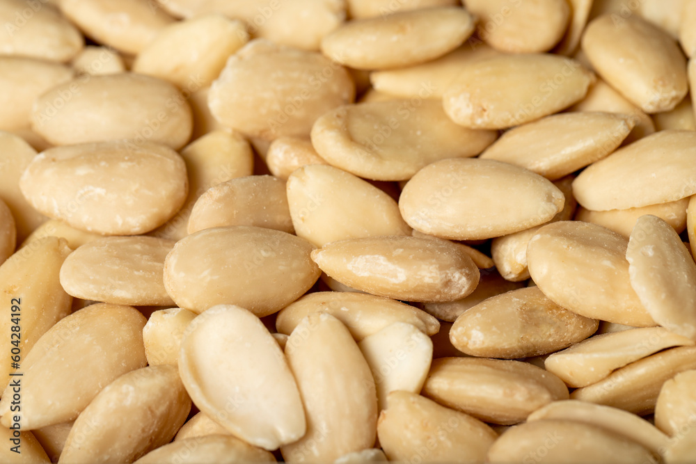 Almond. Peeled almonds closeup food background. texture. copy space banner Almond. Peeled almonds closeup food background. texture. copy space banner