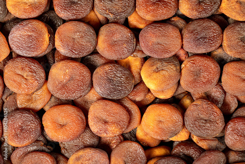 Dried apricots. Naturally dried apricots close up food background. Top view. texture. copy space banner