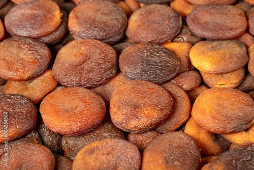 Dried apricots. Naturally dried apricots close up food background. texture. copy space banner