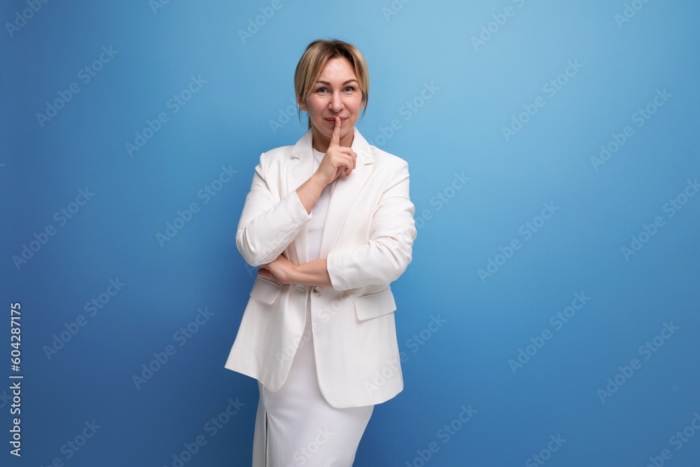 well-groomed confident young caucasian blond lady in an elegant look well-groomed confident young caucasian blond lady in an elegant look
