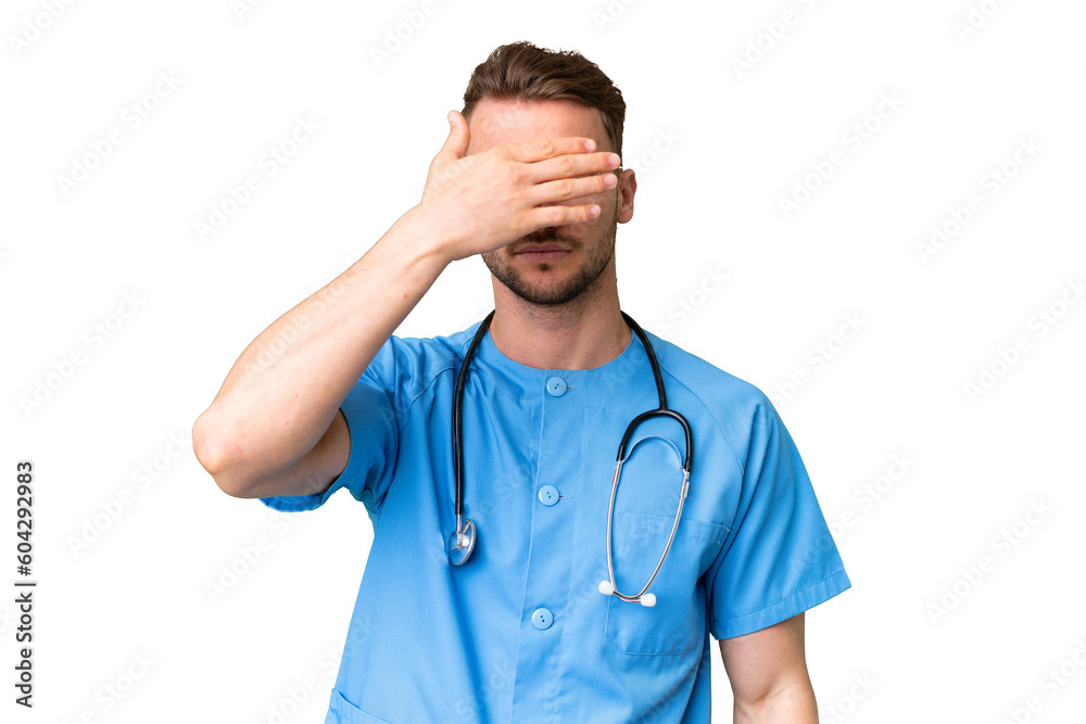 Young nurse man over isolated chroma key background covering eyes by hands. Do not want to see something Young nurse man over isolated chroma key background covering eyes by hands. Do not want to see something