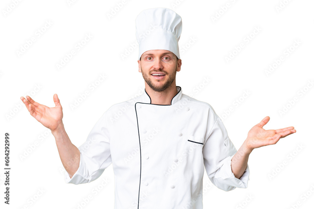 Young caucasian chef over isolated chroma key background with shocked facial expression Young caucasian chef over isolated chroma key background with shocked facial expression
