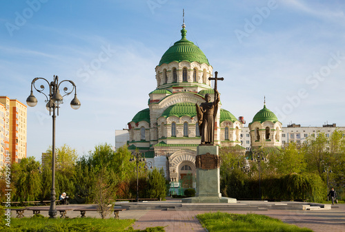 Monument to the Holy Prince Vladimir against the backdrop of the Vladimir Cathedral in Astrakhan. Russia