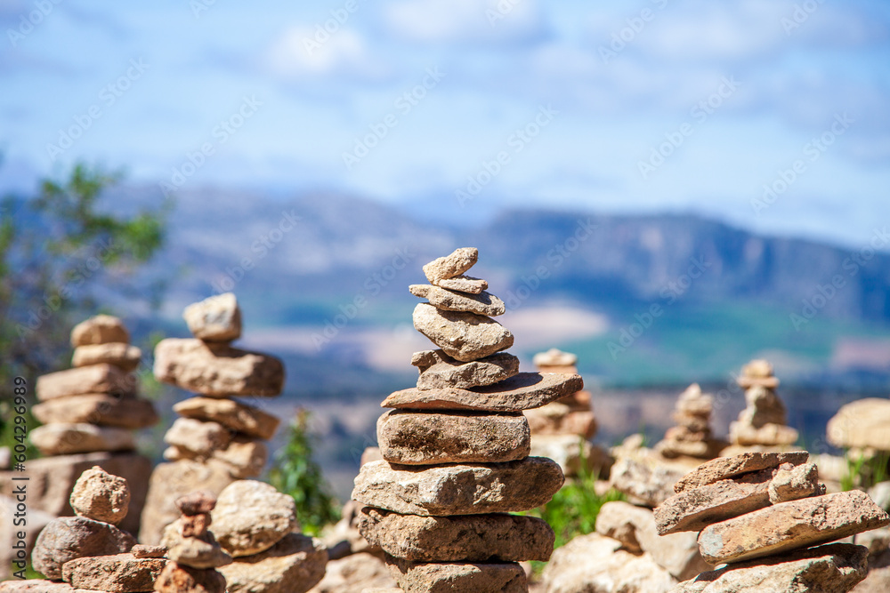 Cairns, stones and rocks stacked and balanced in shapes