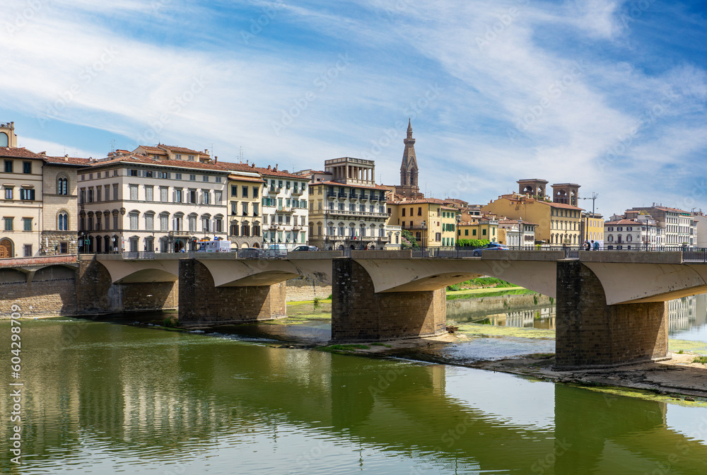 Ponte alle Grazie medieval bridge on Arno river in Florence. Tuscany, Italy