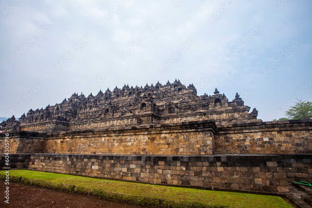 Borobudur Temple, a Buddhist temple located in Magelang, DI Yogyakarta, Indonesia. It is the largest Buddhist temple in the world decorated with many stupas and Buddha statues.