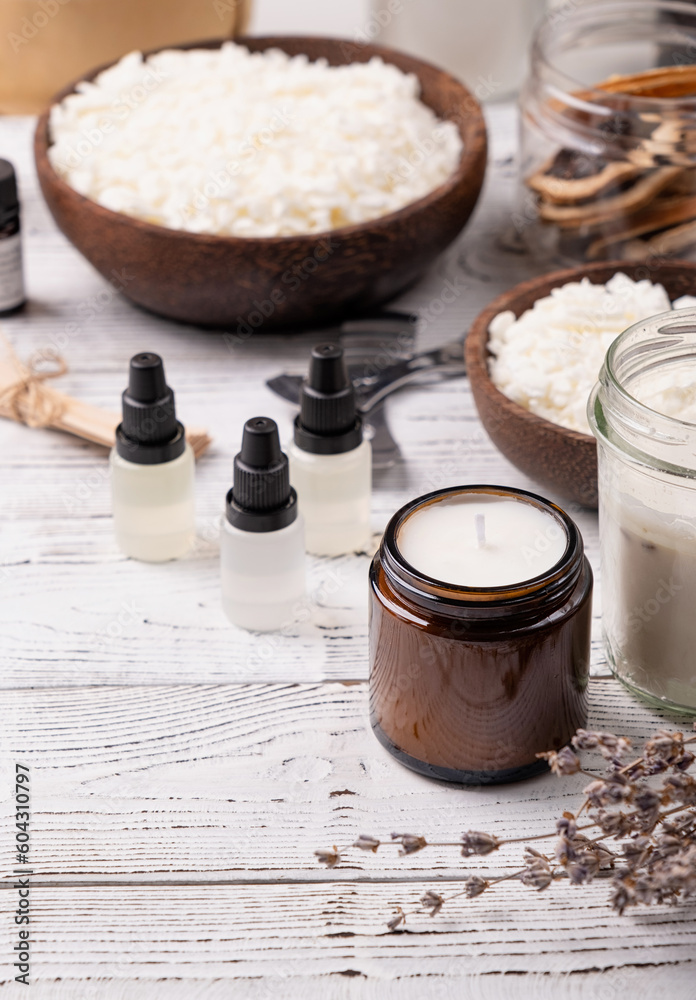 Set for crafting candle on wooden background. Eco soy wax and candle making tools top view, flat lay Set for crafting candle on wooden background. Eco soy wax and candle making tools top view, flat lay